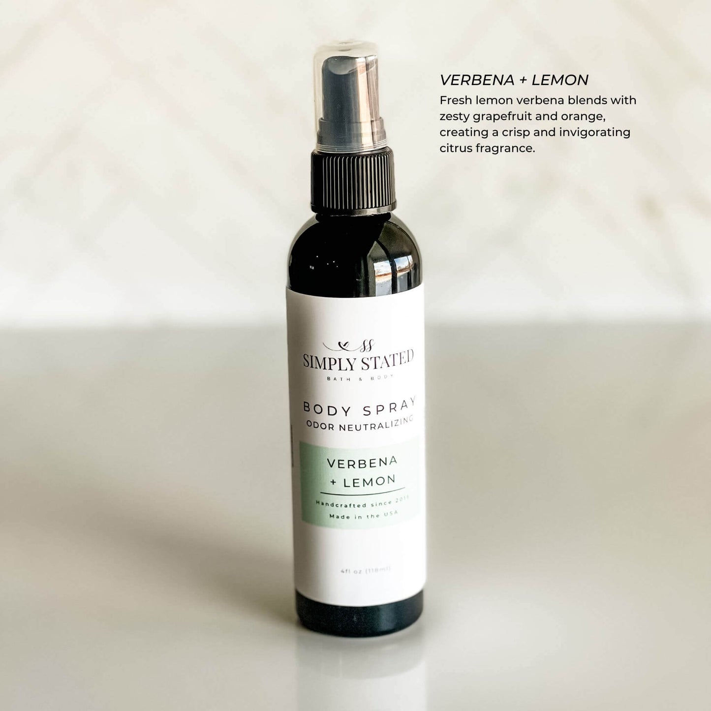 Simply Stated Body Spray in Verbena + Lemon scent, featuring a fresh green color accent and crisp, citrus-inspired aroma.