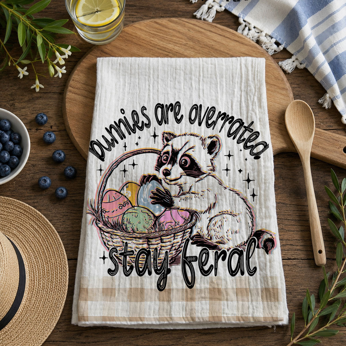 Humorous raccoon towel Easter basket stay feral farmhouse
Funny saying Easter dish towel raccoon humor gingham
Sarcastic raccoon kitchen towel bunnies overrated Easter
Witty Easter towel funny raccoon eggs farmhouse spring