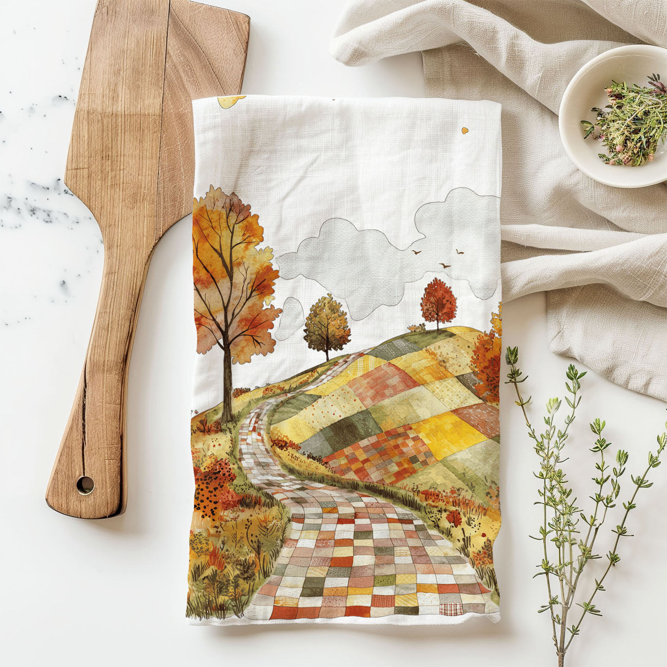 autumn countryside kitchen towel with trees and leaves
cozy season dish towel with painted fall road artwork
fall foliage landscape towel for thanksgiving hostess gift
country road in autumn cotton towel for rustic décor