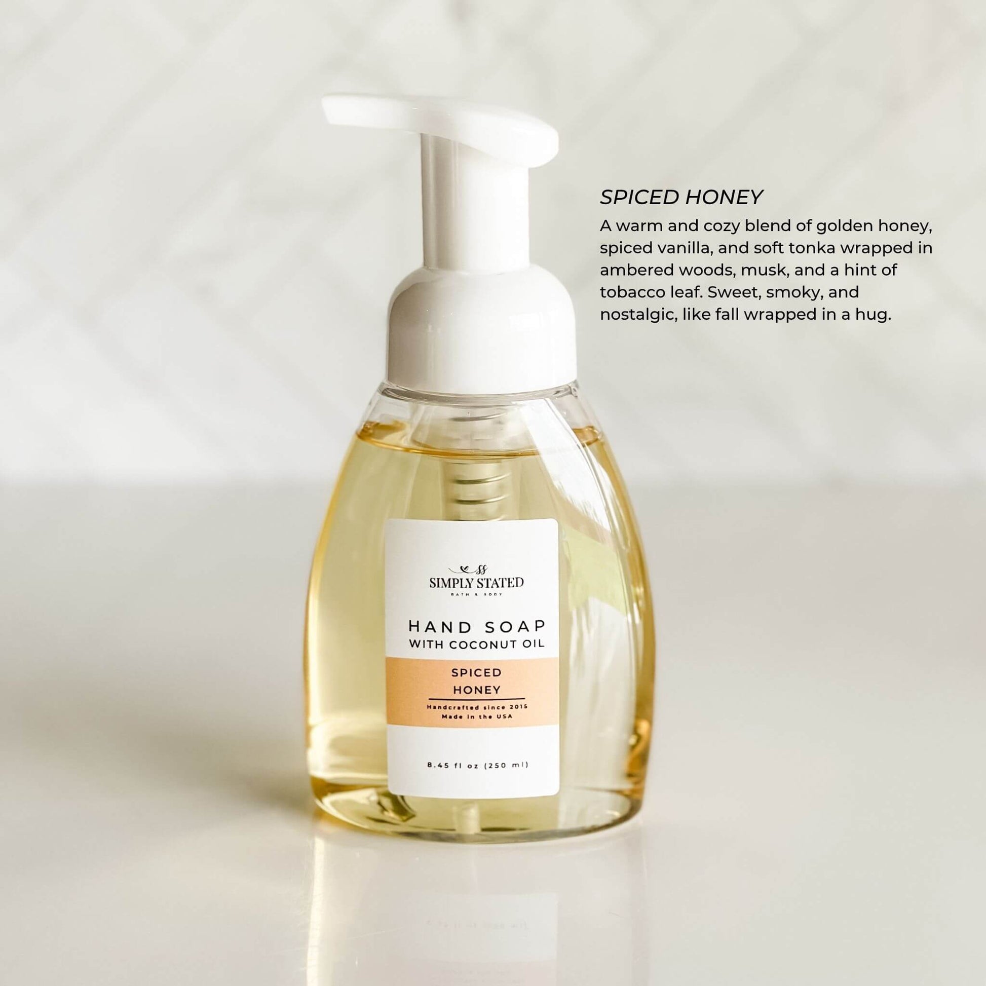 Spiced Honey Hand Soap with golden label and cozy vanilla scent profile
