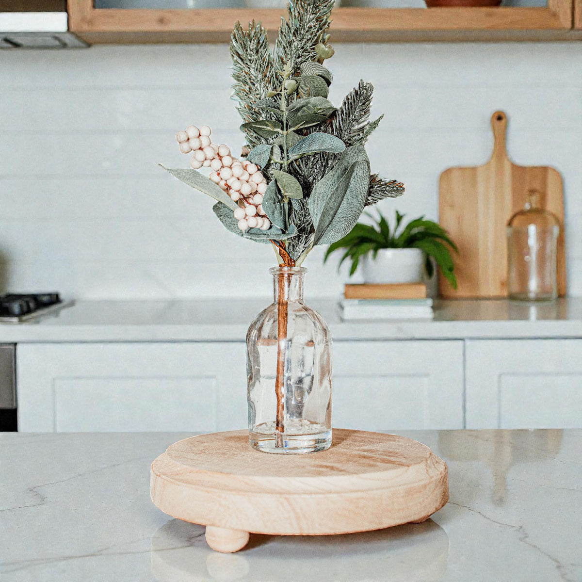 Rustic brown round wood tray and natural wood tray set
side by side rustic and natural wooden riser stands
bottom view of round wooden tray with ball feet
neutral round wood pedestal for candle and vase
elevated wooden tray for kitchen sink soap station