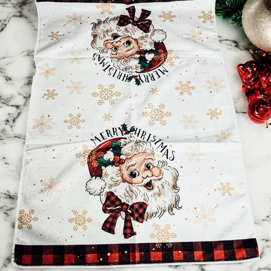 Holiday hand towel with vintage Santa and retro Christmas charm
Merry Christmas dish towel with Santa Claus and festive gold details
Rustic holiday kitchen decor with vintage Santa Christmas towel

