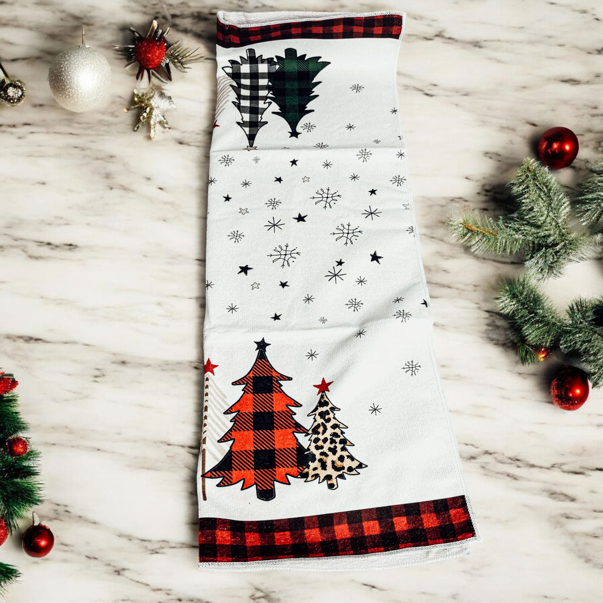 Christmas kitchen towel with gingham trees, snowflakes, and holiday charm
Decorative Christmas hand towel with mixed gingham designs and holiday motifs