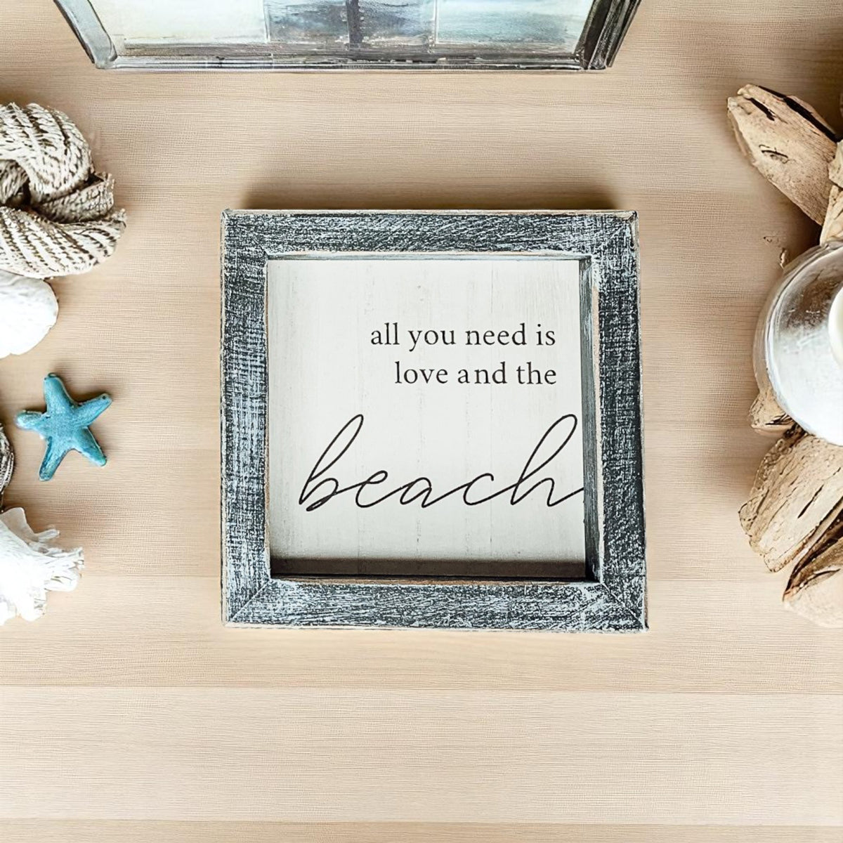 Beach quote wall art with gray distressed frame and coastal accents