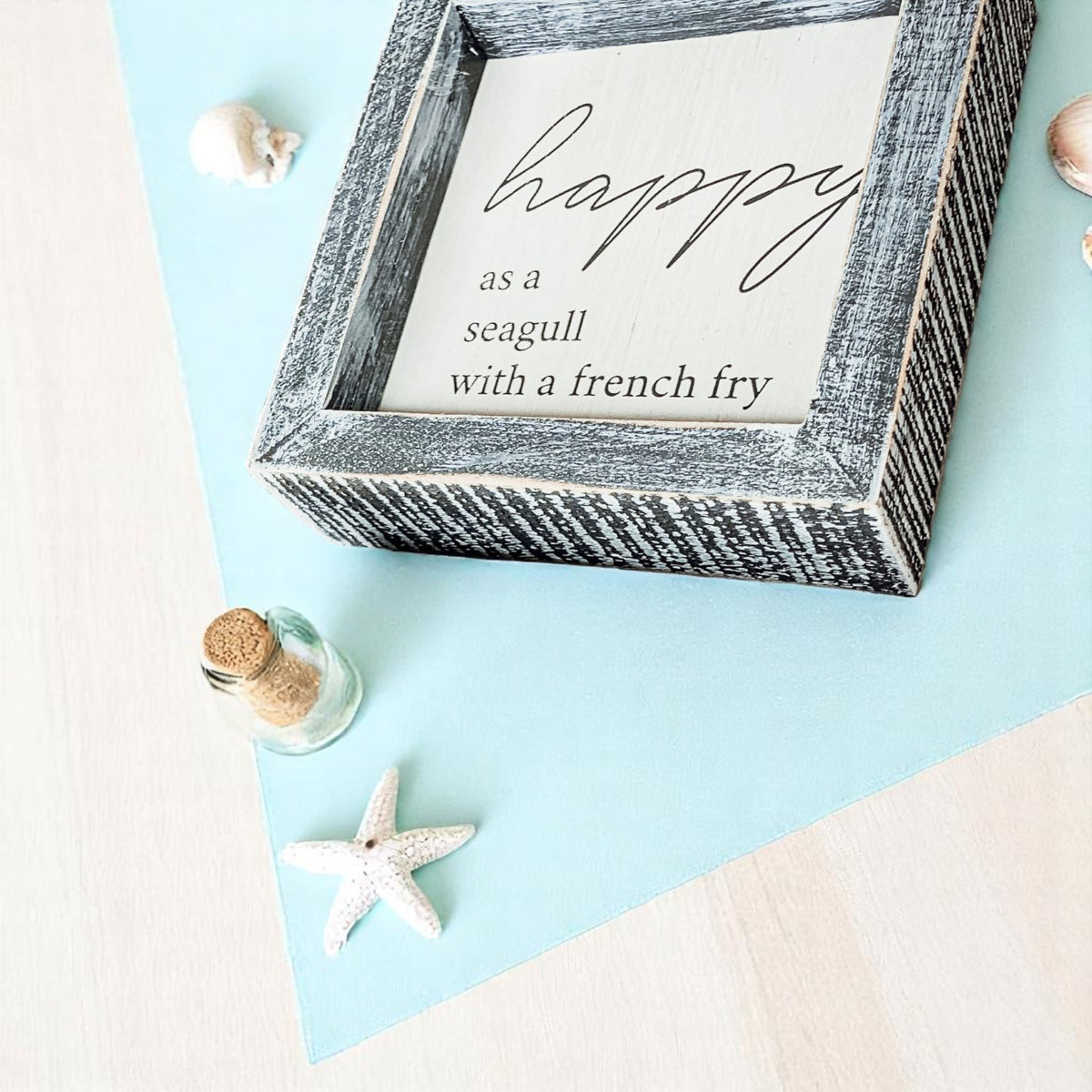 Coastal farmhouse decor with love and beach quote