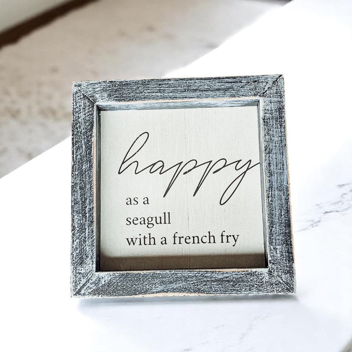 Happy as a seagull with a french fry wooden sign with distressed gray frame