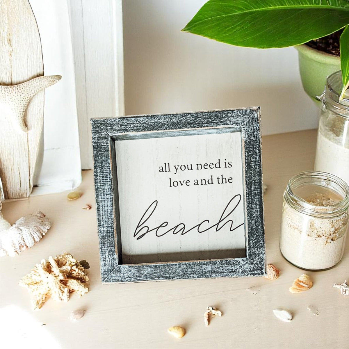Coastal farmhouse decor with love and beach quote