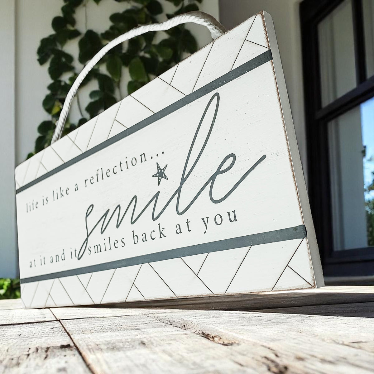 Life is like a reflection smile beach sign with geometric border