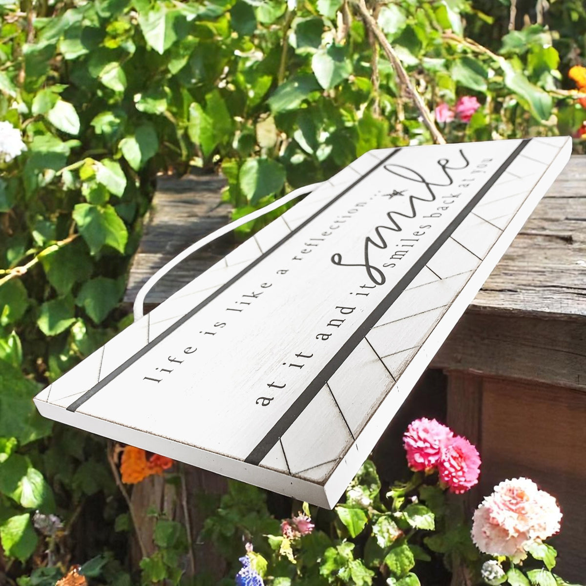 White wooden wall art with geometric pattern and smile quote