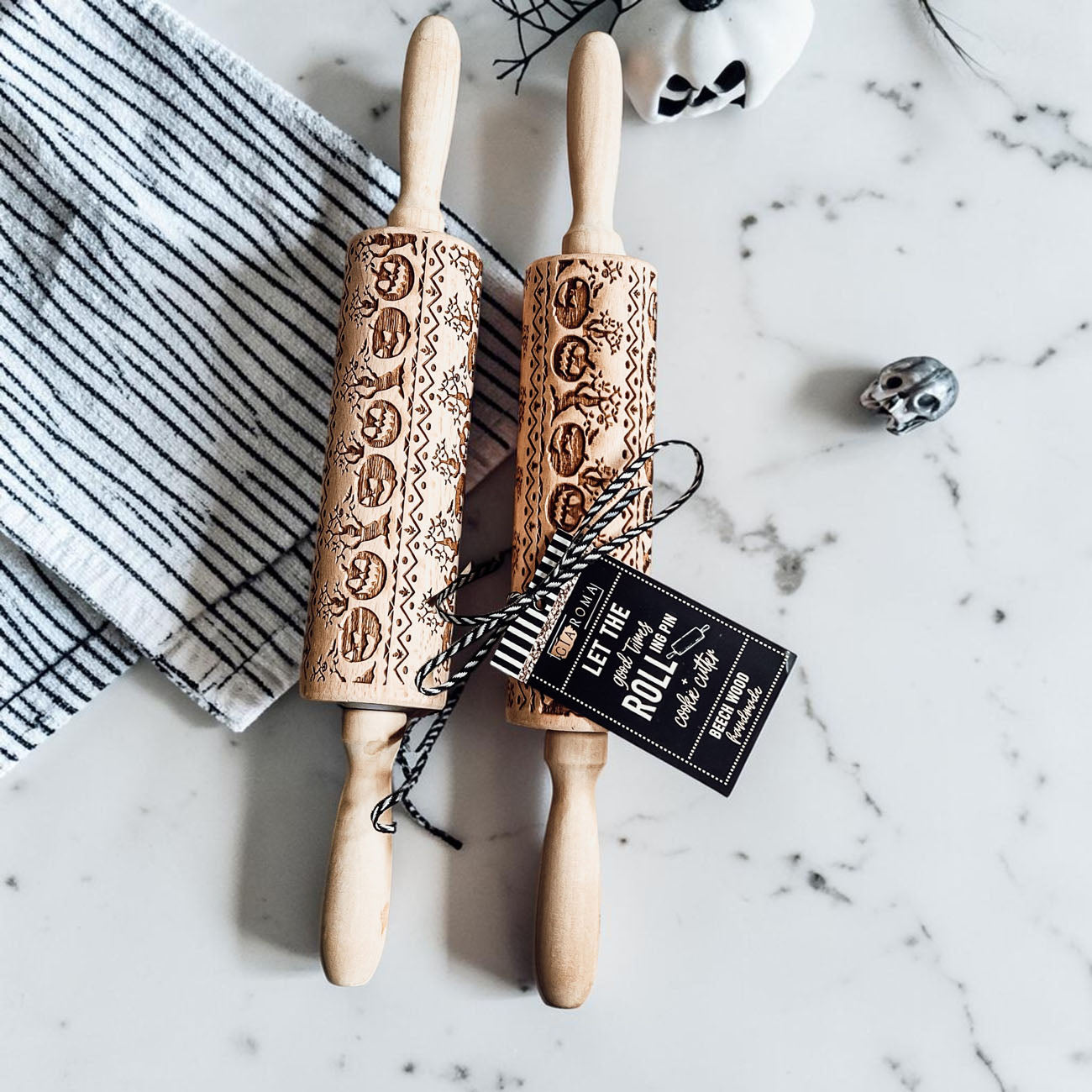 Halloween themed rolling pin for cookies
pumpkin engraved rolling pin on kitchen counter
cookie dough roller with Halloween pattern
embossed rolling pin for decorative cookies
wooden baking roller pumpkin detail close up
Halloween cookie making tools rolling pin
fall baking setup with pumpkin rolling pin
