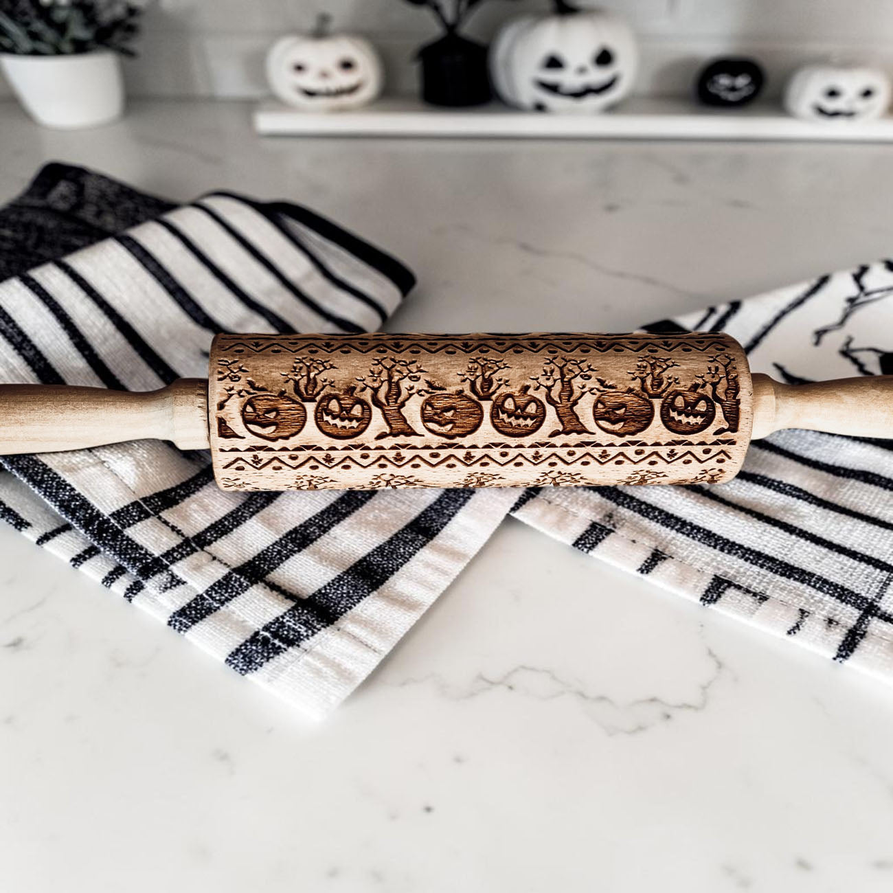 pumpkin pattern rolling pin for pie crust
Halloween baking tools wooden rolling pin
embossed rolling pin for sugar cookies Halloween
fall themed rolling pin with pumpkins and trees
Halloween cookie stamp rolling pin wood