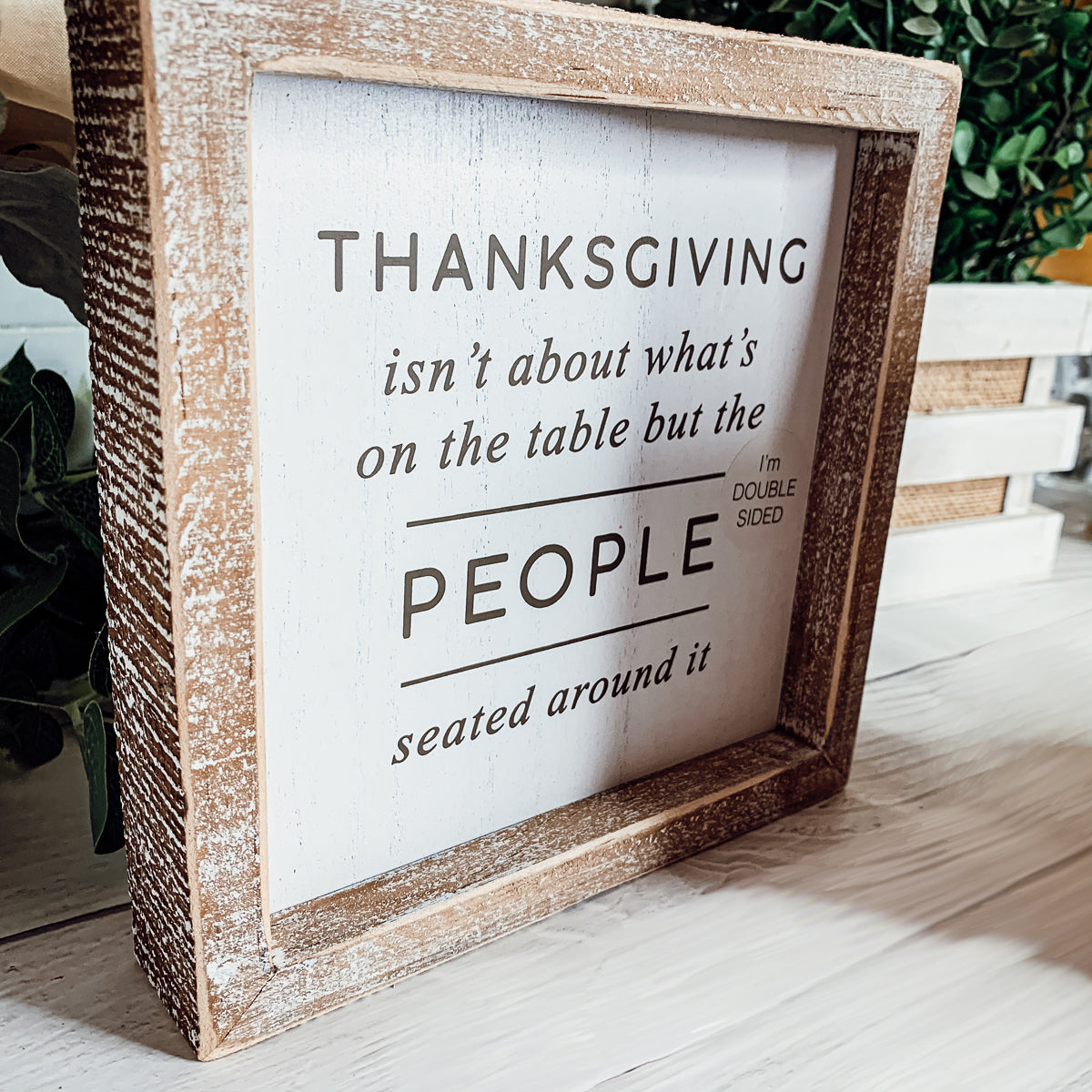 Thanksgiving isn't about what's on the table but the people seated around it sign