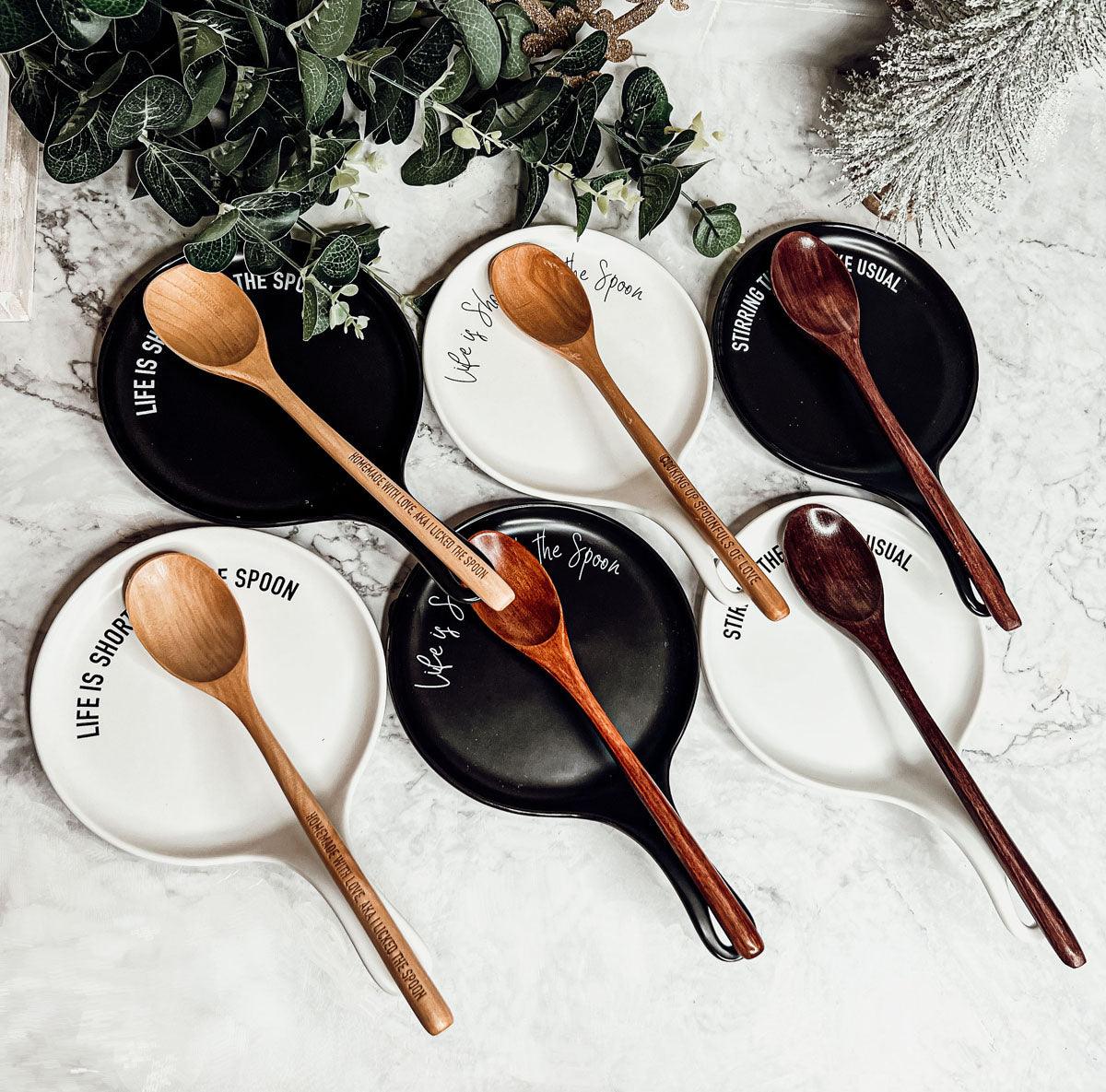 9-inch ceramic spoon rest with hand-lettered baking quote
Porcelain spoon rest with matching wooden spoon and gift ribbon