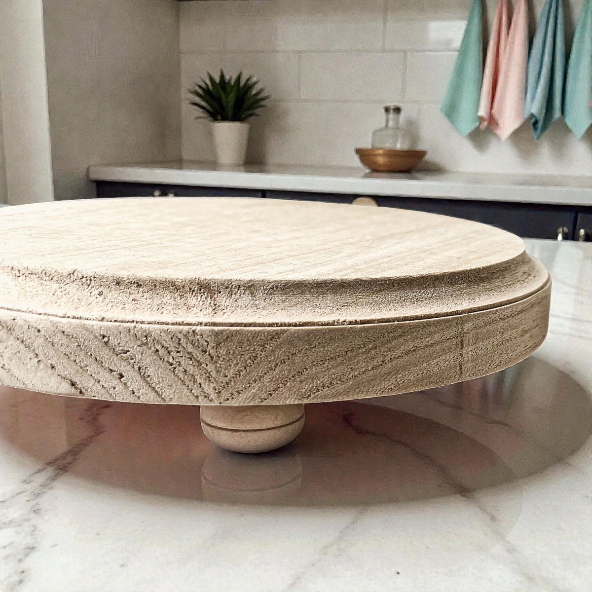 Handmade wooden display stand with necklaces and bracelets
Natural wood pedestal tray jewelry organization ideas
Elevated wooden organizer tray with watches and accessories
Round wooden tray with feet holding candles farmhouse decor