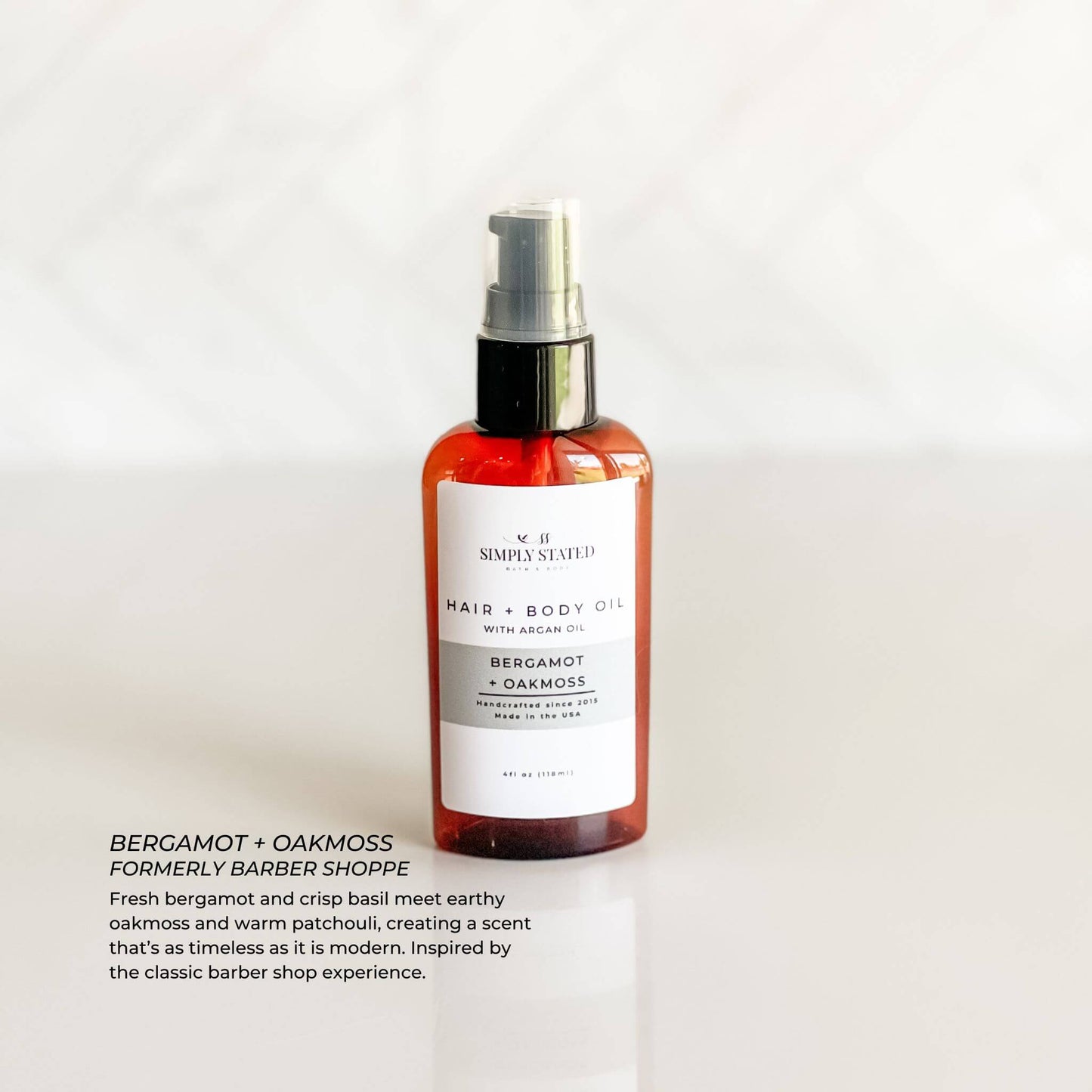 Bergamot + Oakmoss Men’s Beard + Body Oil in amber bottle with minimalist label