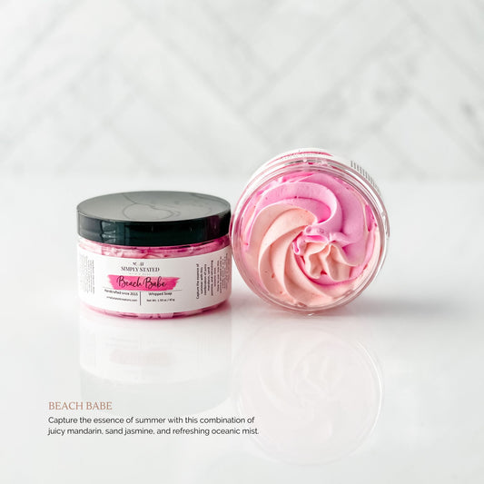 Sun-Kissed Collection Whipped Soap in Beach Babe. Capture the essence of summer with this combination of juicy mandarin, sand jasmine, and refreshing oceanic mist.