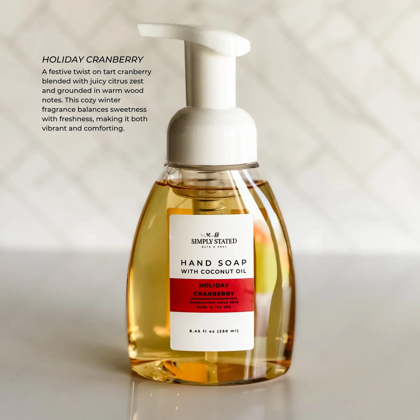 Hand soap bottle with a label on a light background