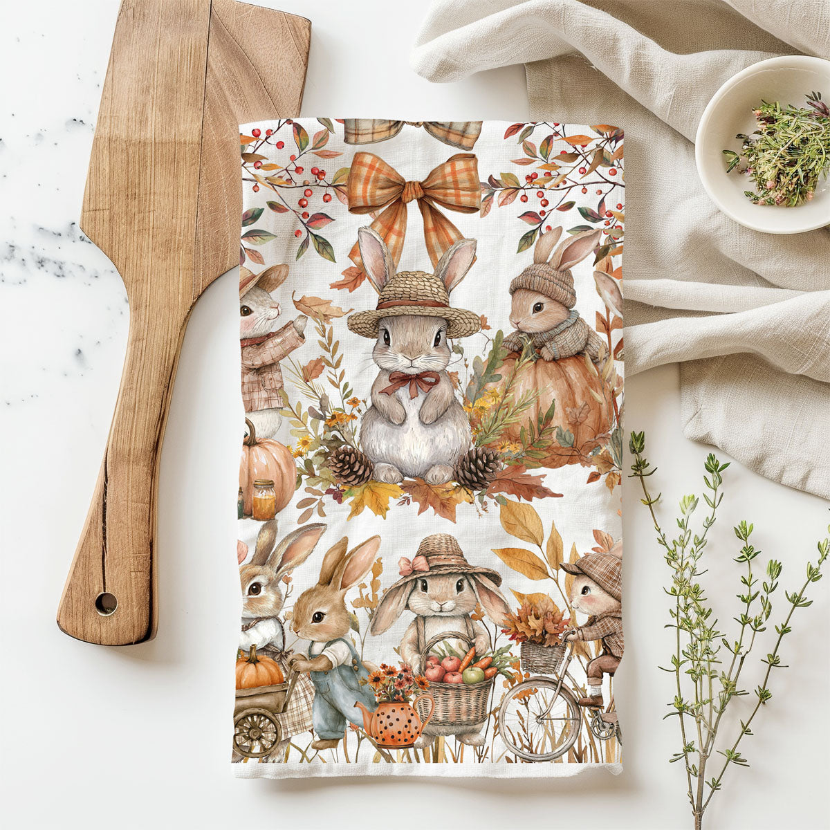 vintage style bunny illustration towel for fall décor
fall rabbit kitchen towel with cozy scarves and hats
autumn bunny cotton towel on rustic wood board
whimsical bunny fall towel for children’s kitchen décor
fall kitchen accent towel with bunnies riding bicycle