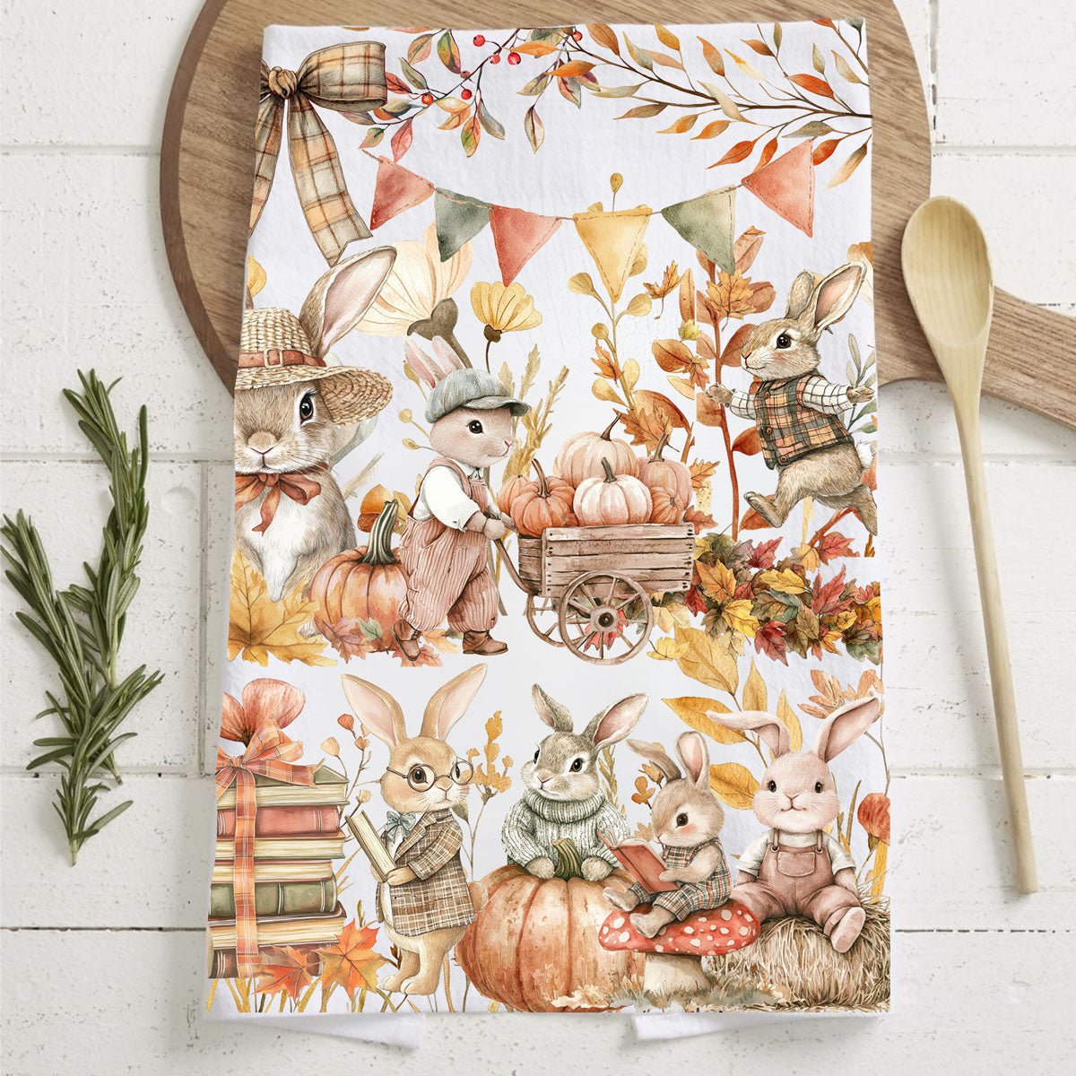 fall rabbit kitchen towel beside wooden spoon and herbs
storybook bunny and pumpkin design flour sack towel
neutral autumn bunny towel for farmhouse fall décor
cozy fall vignette with bunny kitchen towel and mini pumpkins
storybook woodland bunny towel perfect for nursery or play kitchen
