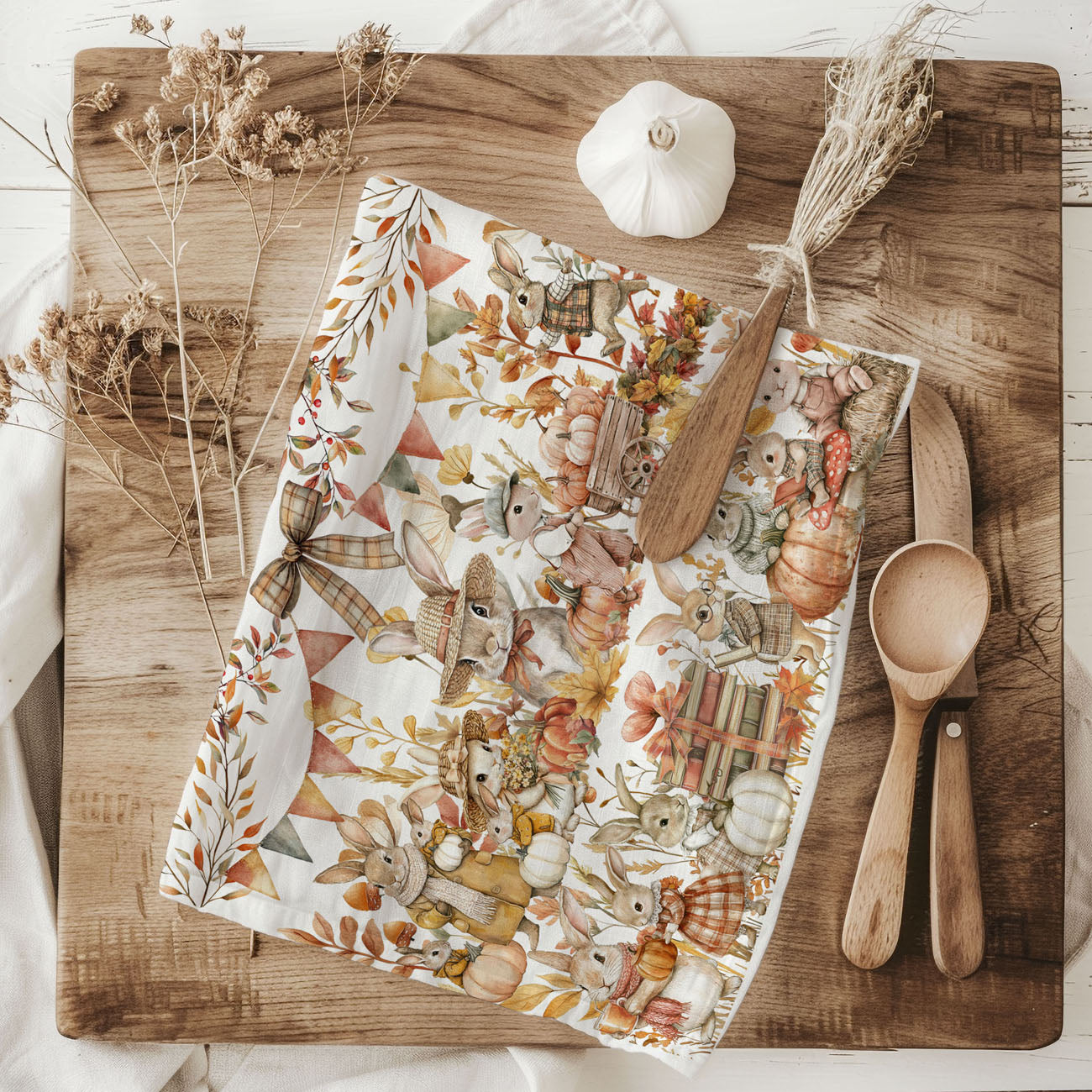 autumn rabbit and white pumpkin kitchen decor towel
pumpkin spice season bunny kitchen towel
fall animal kitchen towel with bunnies and foliage
pumpkin cart bunny cotton towel for autumn housewarming gift
fall bunny and lantern illustration on flour sack towel