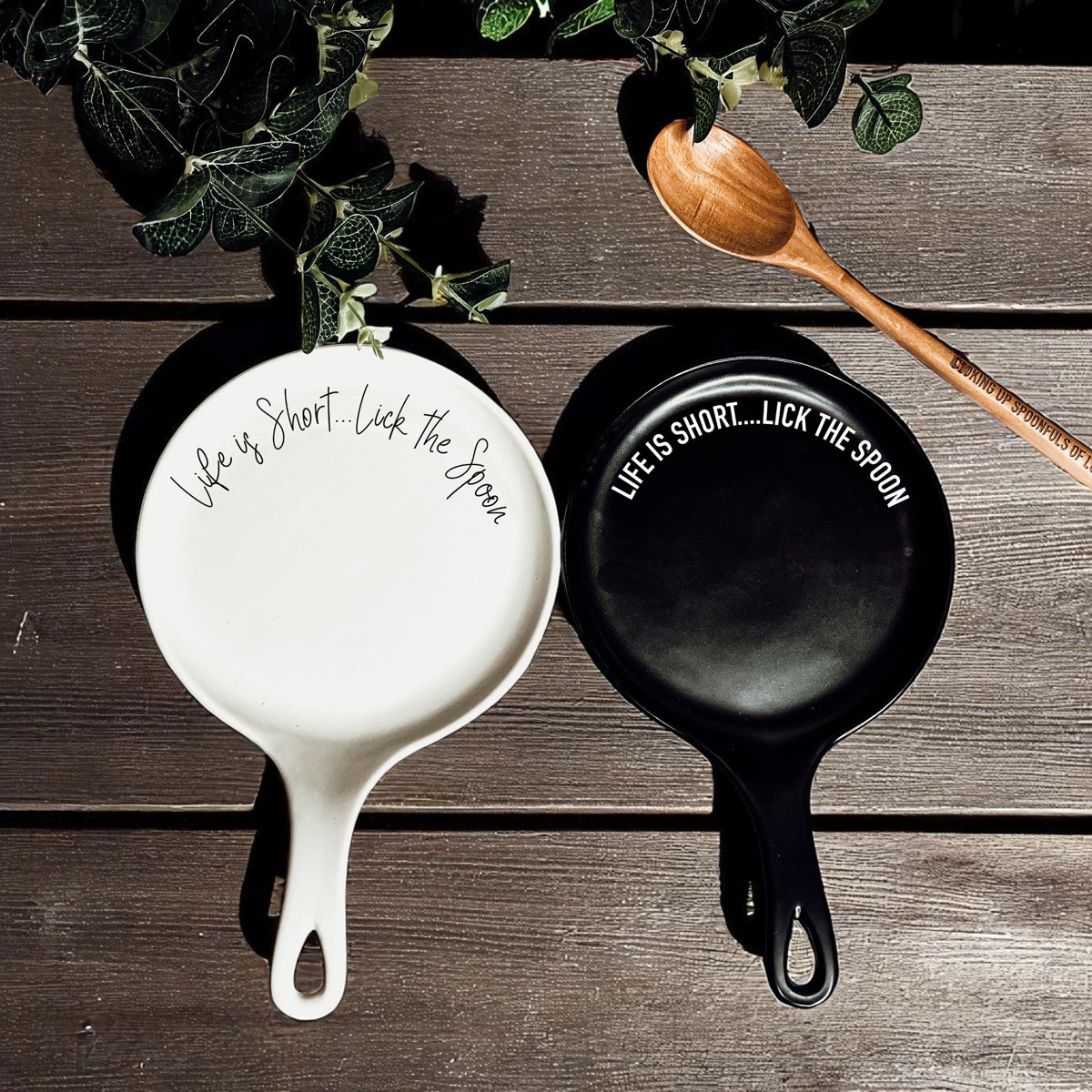 Kitchen gift set featuring spoon rest and wooden spoon with inspirational quote
Dishwasher safe ceramic spoon rest with funny baking message