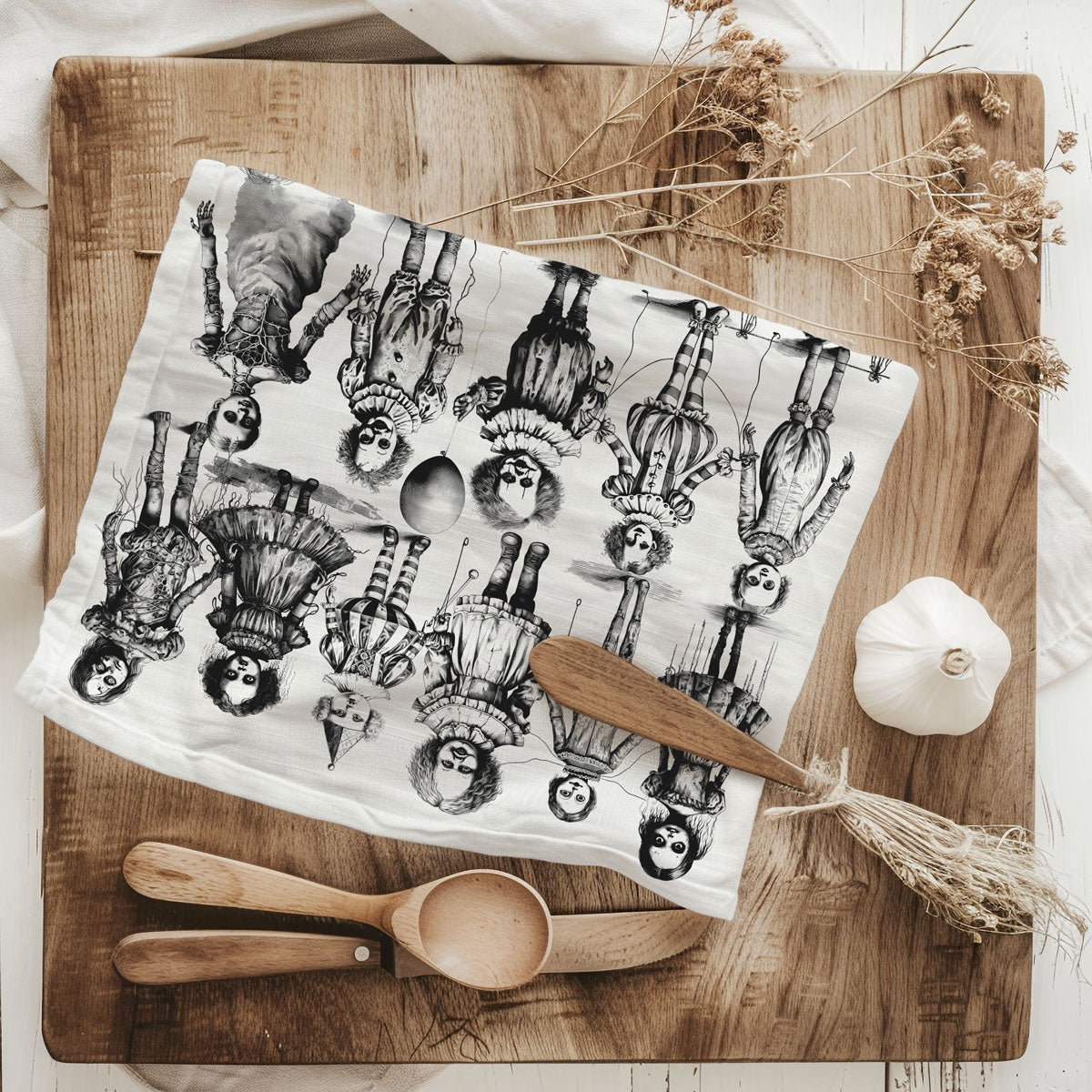 vintage clown and doll halloween dish towel on cutting board
gothic halloween kitchen towel with spooky dolls and clowns
halloween hand towel with creepy vintage dolls