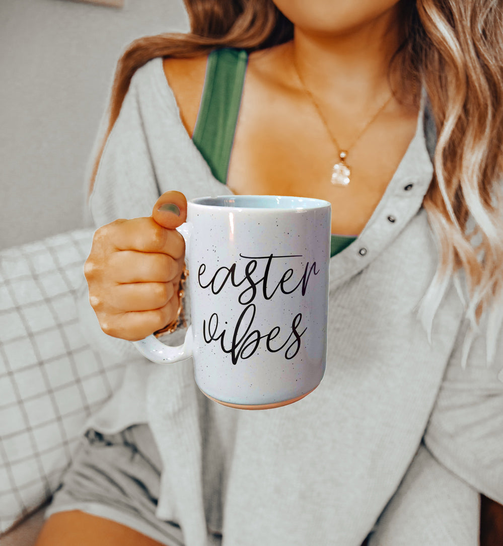 Light blue Easter Coffee Mug that says easter vibes in cursive script font