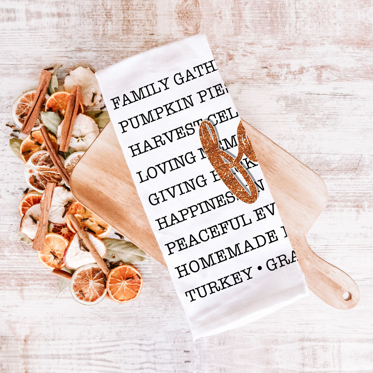 autumn kitchen décor towel with harvest inspired phrases
fall words dish towel styled with mini pumpkins and leaves
cozy fall slogan towel for modern neutral kitchen
autumn kitchen hand towel featuring favorite fall activities
