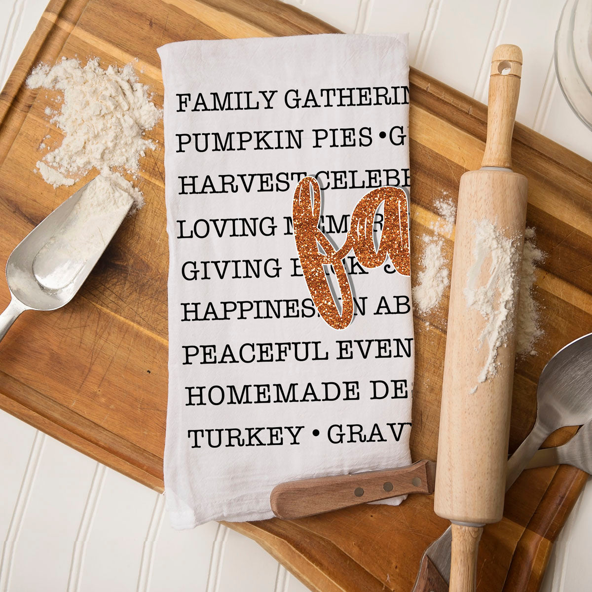 fall lettering towel perfect for pumpkin spice coffee station
autumn phrases tea towel hanging from cabinet handle
fall themed hostess gift with typography kitchen towel
cozy season cotton towel for cider bar and snack table