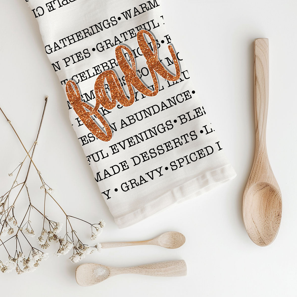 fall word art kitchen towel hanging on oven handle
autumn text towel with cozy sweaters apple cider pumpkin pie
fall kitchen décor towel with glitter style fall lettering
seasonal fall kitchen accessory cozy words dish towel 
Fall Words Flour Sack Kitchen Towel 