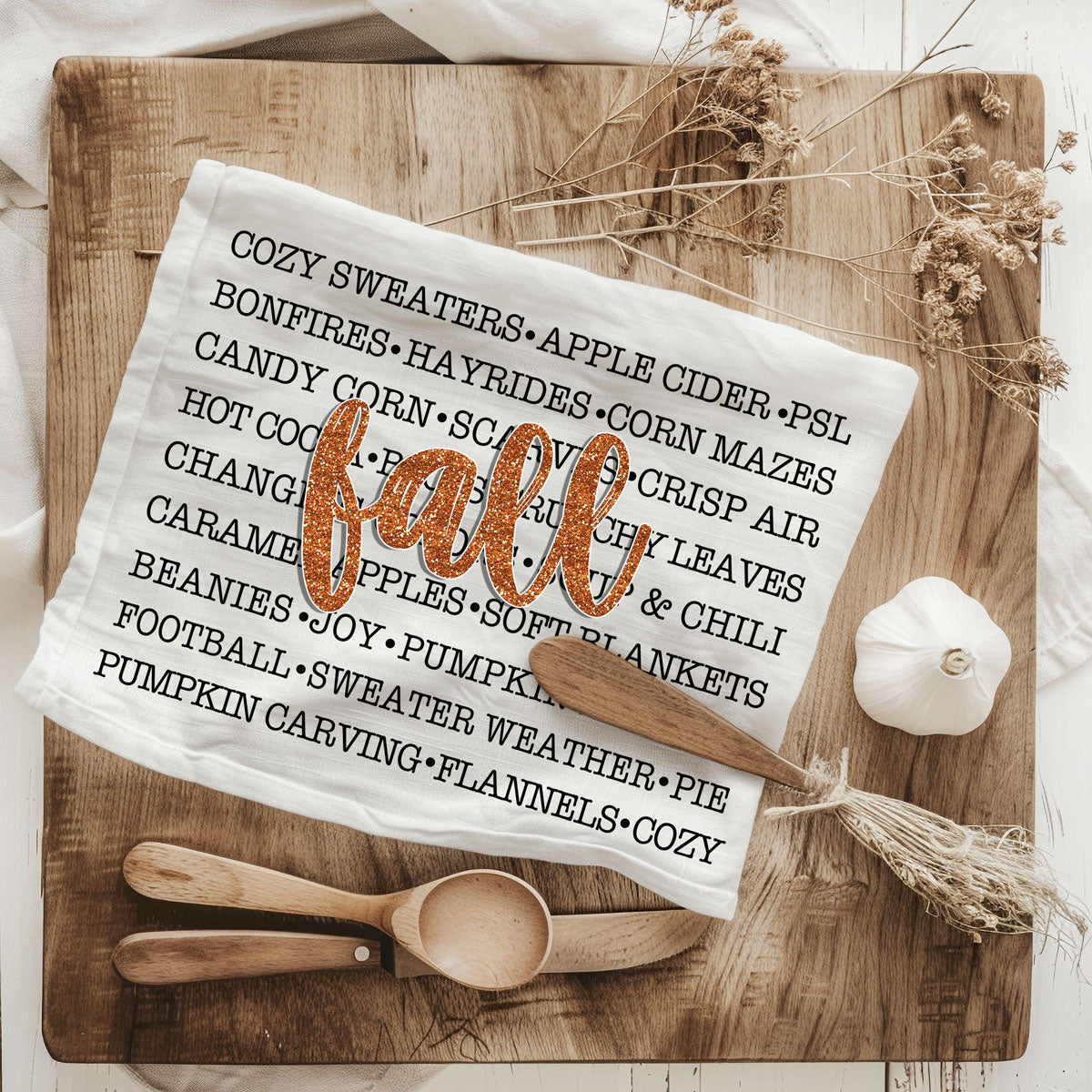 fall print kitchen towel for holiday entertaining
autumn home essentials fall text cotton dish towel
fall phrases towel layered with plaid napkins for tablescape
cozy fall kitchen accessory with modern typography print