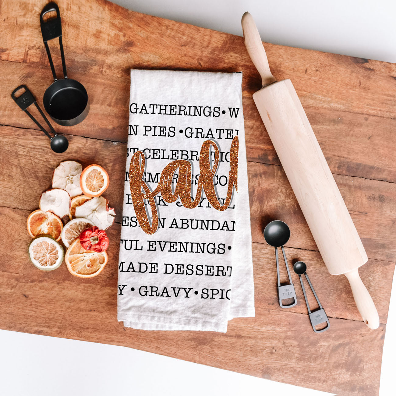 giftable fall kitchen towel with cozy seasonal words
autumn home décor accent towel with fall favorites text
pumpkin spice lover fall words tea towel
fall kitchen towel gift for hostess or housewarming