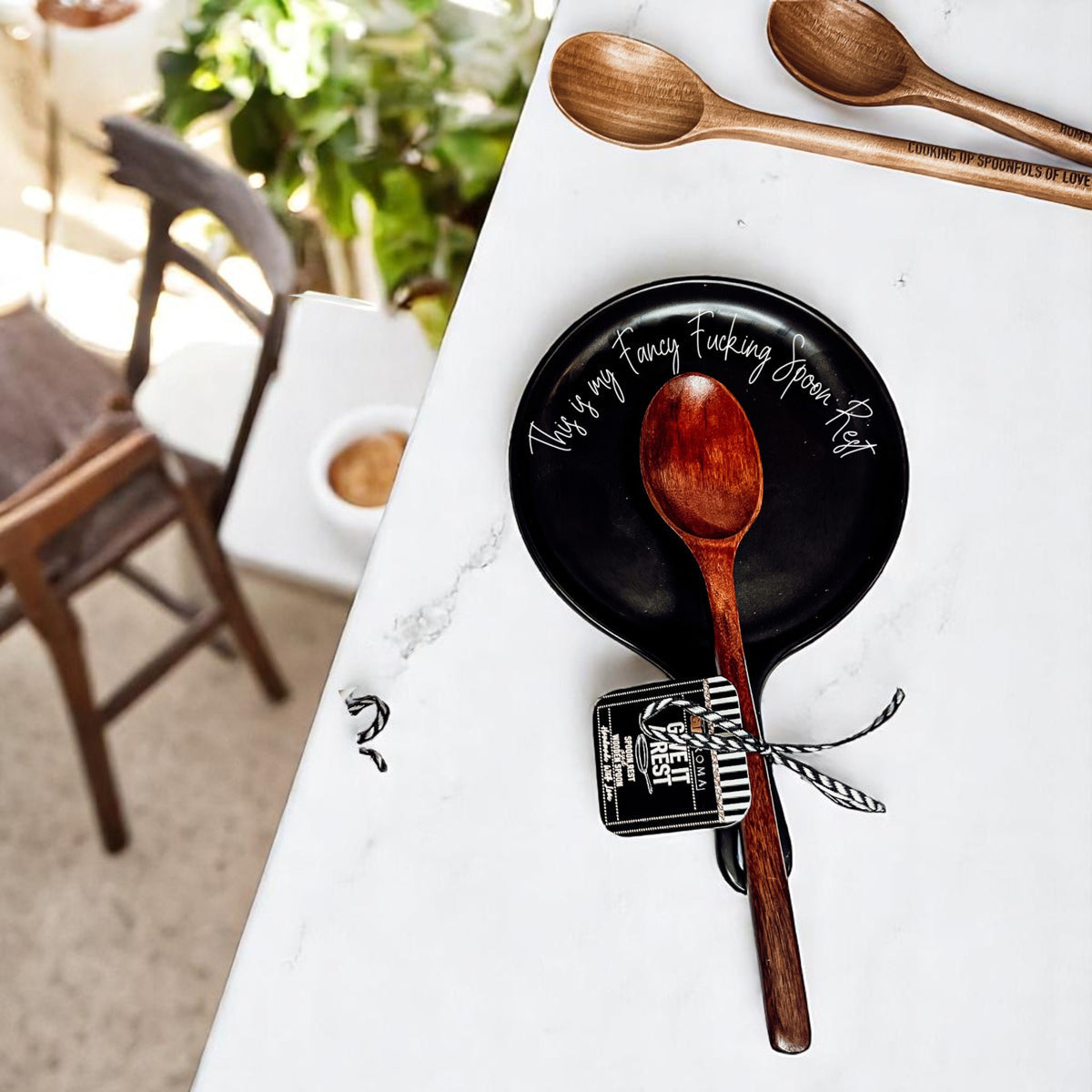 Premium kitchen organization
Luxury cooking tools
Modern black kitchen
Contemporary spoon rest
Special edition ceramics
Distinctive kitchen art