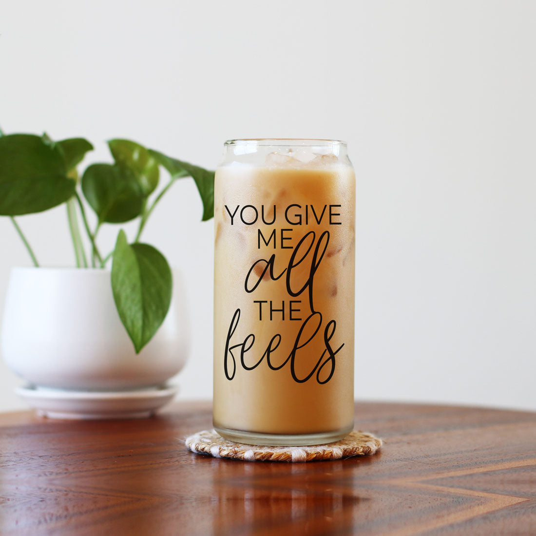 Romantic 20oz glass cup with bamboo lid, straw, and "You Give Me All the Feels" phrase.
"You Give Me All the Feels" 20oz glass cup with bamboo lid and straw for a cute gift.