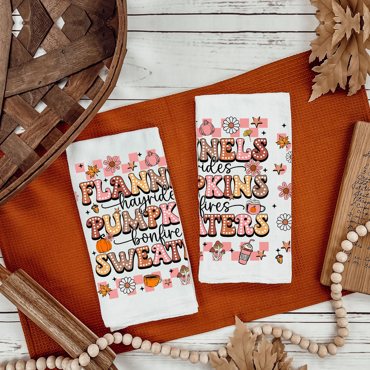 girly halloween kitchen towel with pink autumn graphics
retro pink pumpkin spice towel for fall and halloween décor
pink fall farmhouse towel for modern boho kitchen
pink halloween hostess gift retro fall words dish towel