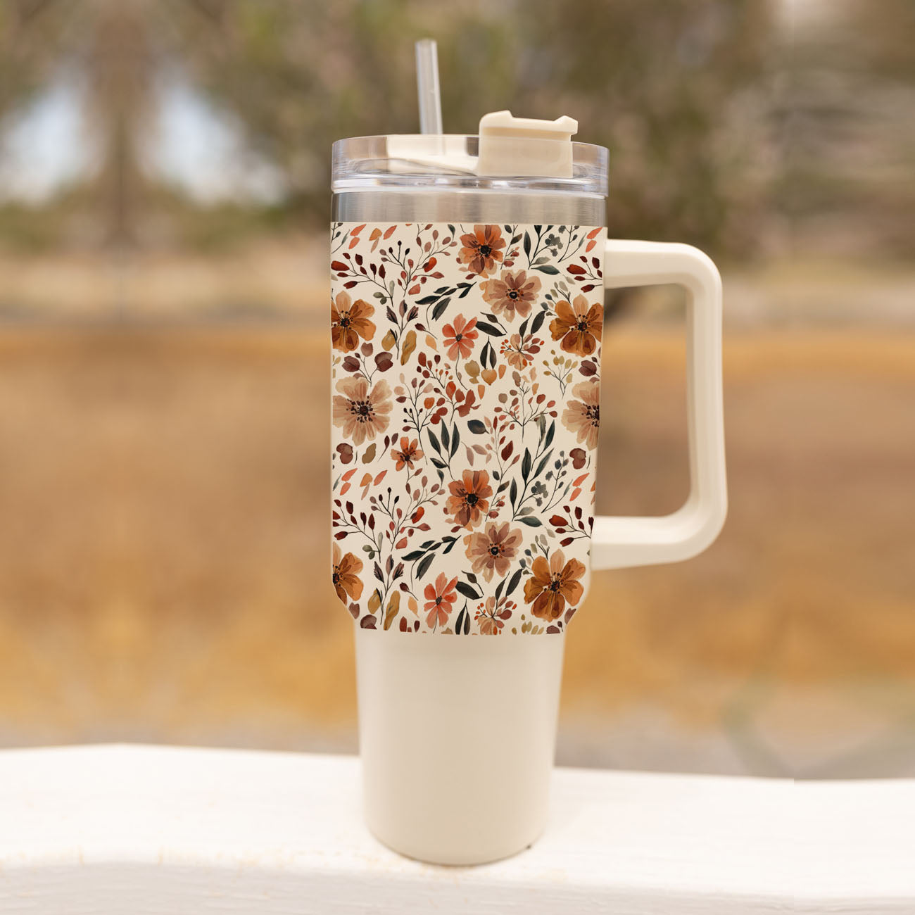 cozy farmhouse autumn tumbler
cute floral tumbler for commuters
fall inspired botanical tumbler
floral cup aesthetic for moms
neutral autumn bouquet cup
cute flower travel mug fall
autumn garden tumbler aesthetic
cozy neutral floral water cup
large handled floral coffee tumbler
Orange brown floral tumbler for autumn
Neutral beige floral tumbler with fall vibe
White tumbler with autumn flower pattern