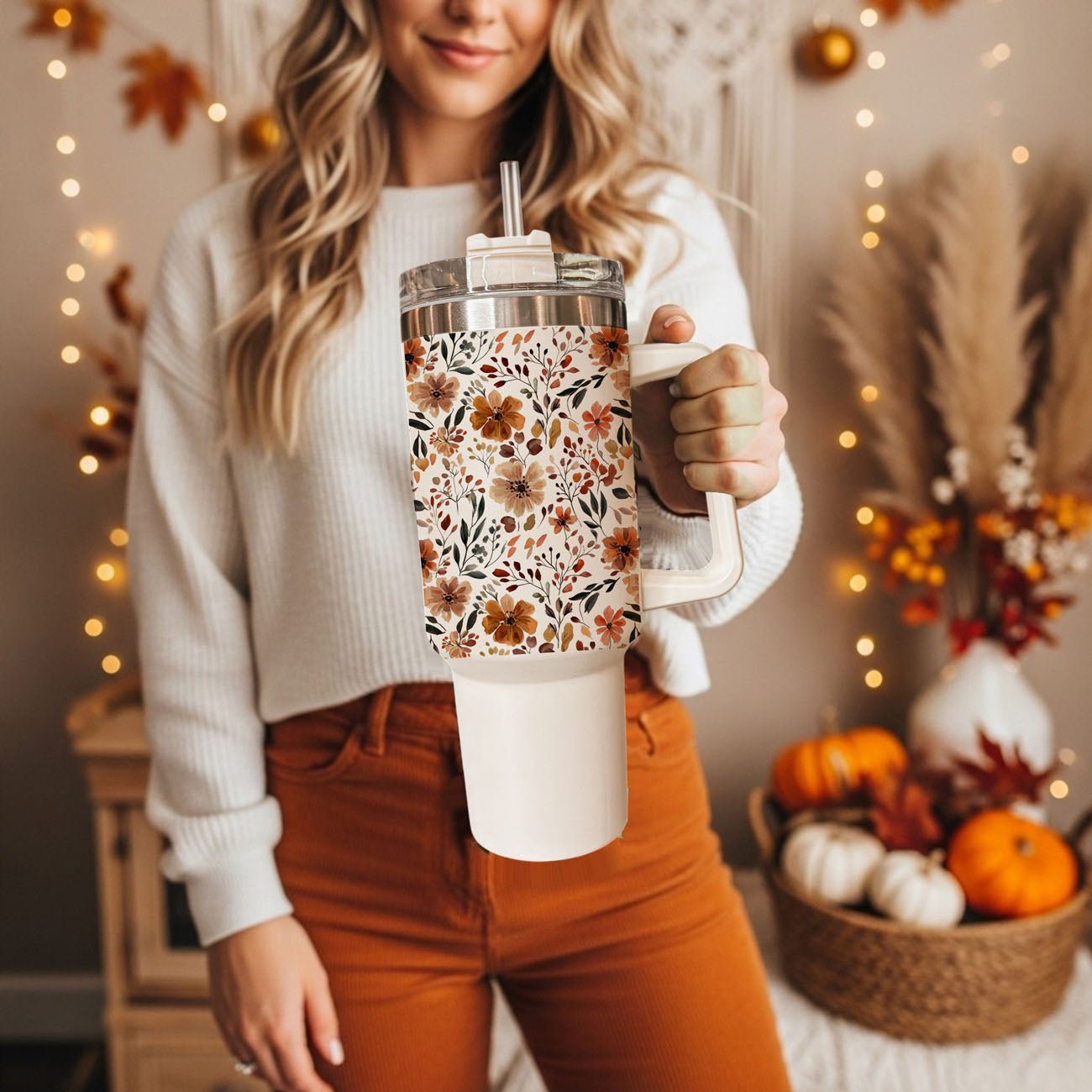 Stay cozy all autumn long with this beautiful floral fall 40oz tumbler featuring a warm neutral flower pattern and insulated stainless steel design. Perfect for iced coffee, tea, water, or seasonal drinks, this handled tumbler keeps beverages hot or cold for hours and includes a reusable straw with spill-resistant lid. 
Autumn floral tumbler for online boutique shoppers
Search optimized fall floral tumbler with handle
SEO alt text for 40oz fall floral tumbler