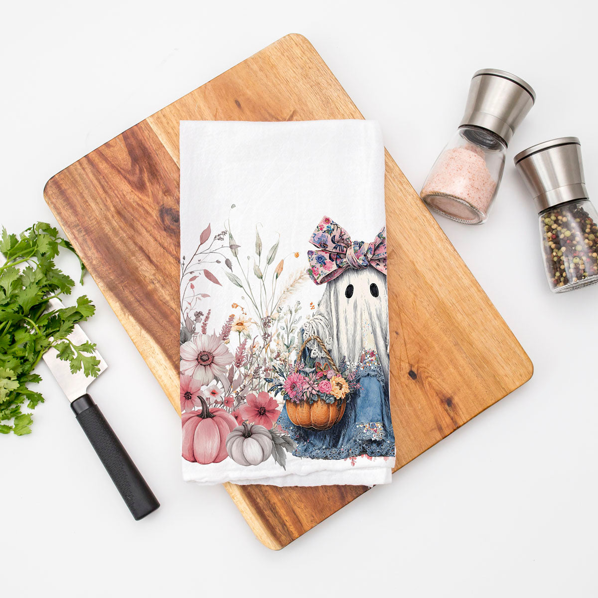 romantic fall ghost towel surrounded by florals
pink farmhouse halloween towel with denim ghost illustration
girly autumn ghost hand towel for powder room décor
cute spooky ghost and floral pumpkin kitchen towel