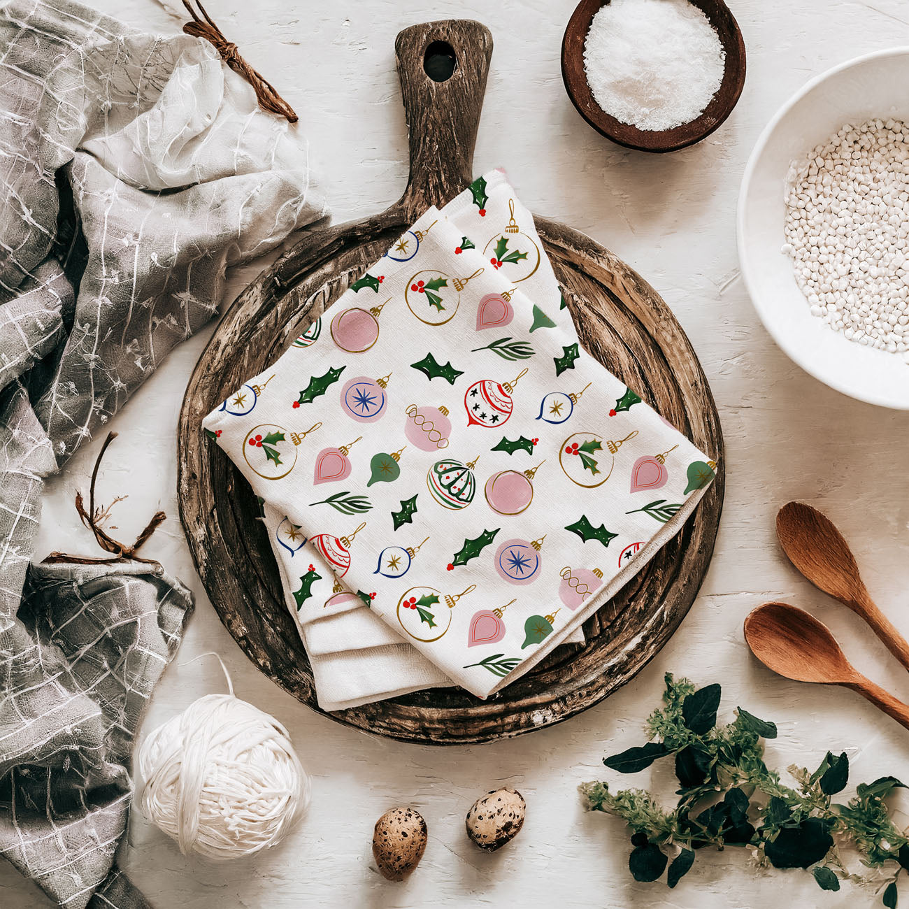 christmas towel styled with greenery and wood
neutral kitchen decor with christmas towel styling
kitchen towel styled farmhouse christmas scene
christmas kitchen must have decor accessory towel
seasonal kitchen decor ideas christmas towel