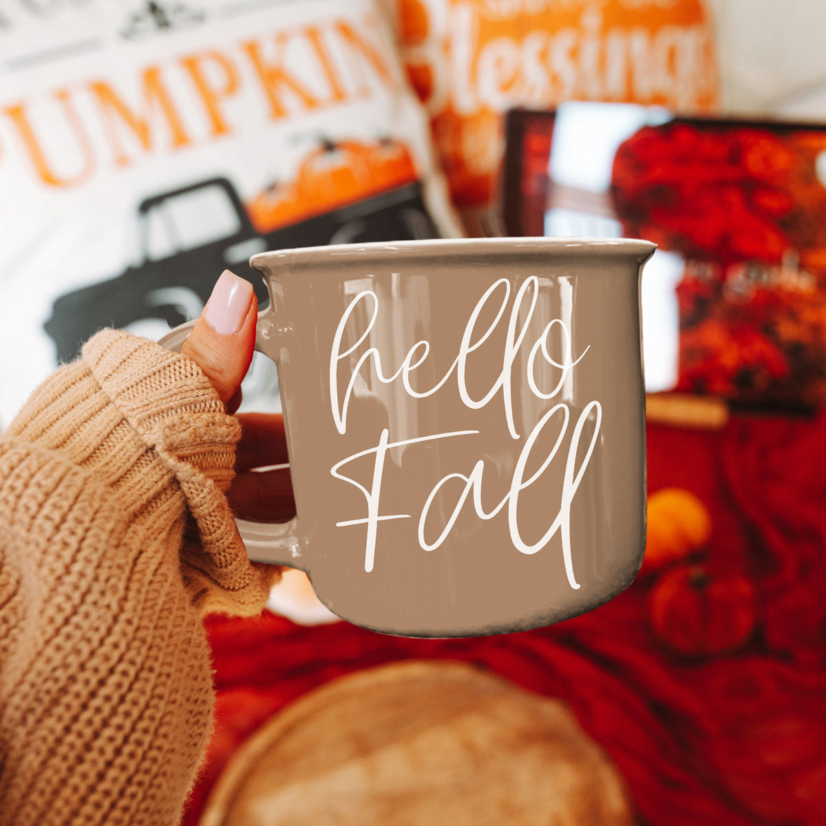 hello fall mug for fall tiered tray styling
hello fall neutral mug with candle and greenery
hello fall mug on white marble countertop
hello fall mug as part of fall gift box
hello fall autumn drinkware in cozy living room
hello fall mug with gold spoon and saucer
hello fall mug on window sill with rainy day view
hello fall coffee mug with neutral fall decor
hello fall mug next to carved pumpkin and lantern