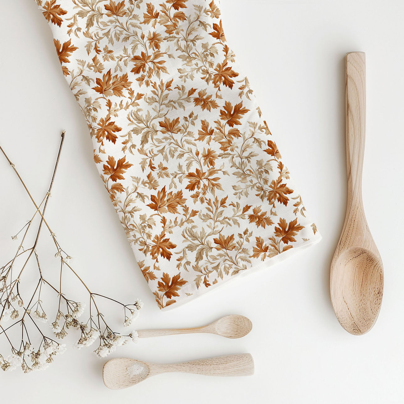 thanksgiving hostess gift fall leaf tea towel
farmhouse fall dish towel on wooden countertop
vintage style autumn leaf print kitchen towel
leafy fall pattern towel for coffee bar decor
neutral fall kitchen towel with warm brown leaves