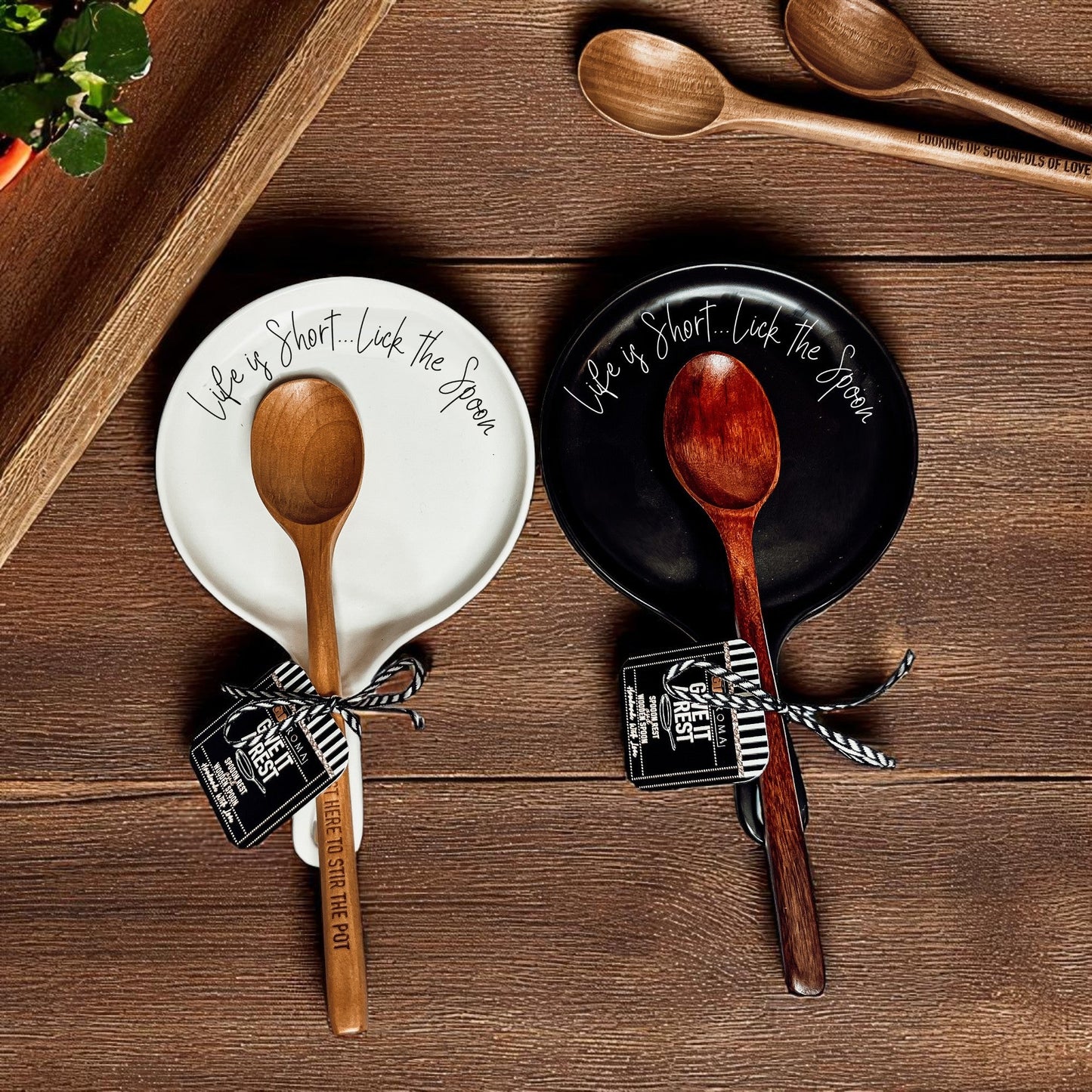 Humorous baking gift set featuring ceramic spoon rest and wooden utensil
Black and white ceramic spoon rest options with motivational baking quote
