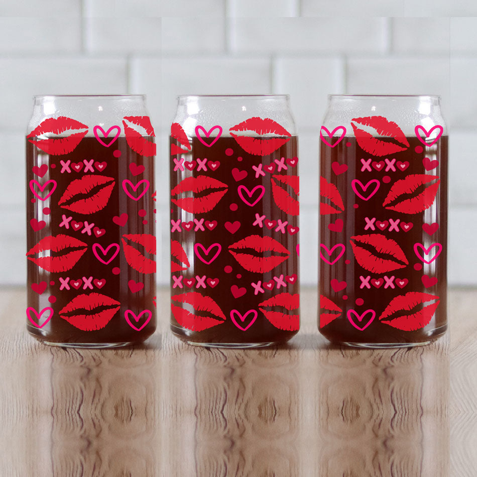 20oz glass cups featuring red lips, hearts, and XOXO graphics for a festive touch.
Bold red lips and heart graphics on 20oz glass cups for a unique Valentine’s gift.
Valentine’s Day gift idea with 20oz glass cups featuring XOXO, red lips, and hearts.