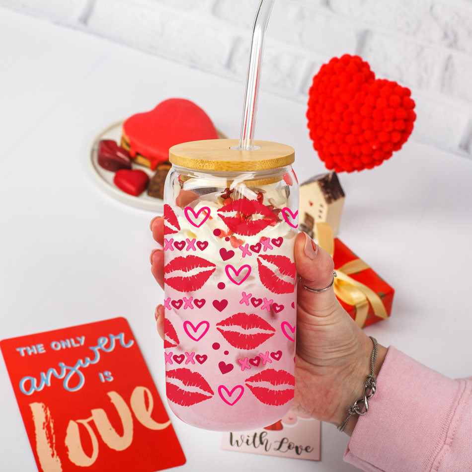 Festive 20oz glass tumblers featuring pink and red XOXO and heart designs.
Bold red lips and XOXO 20oz glass cups for a sassy Valentine’s gift.
Playful 20oz glass cups with red lips, hearts, and XOXO for Galentine’s Day fun.