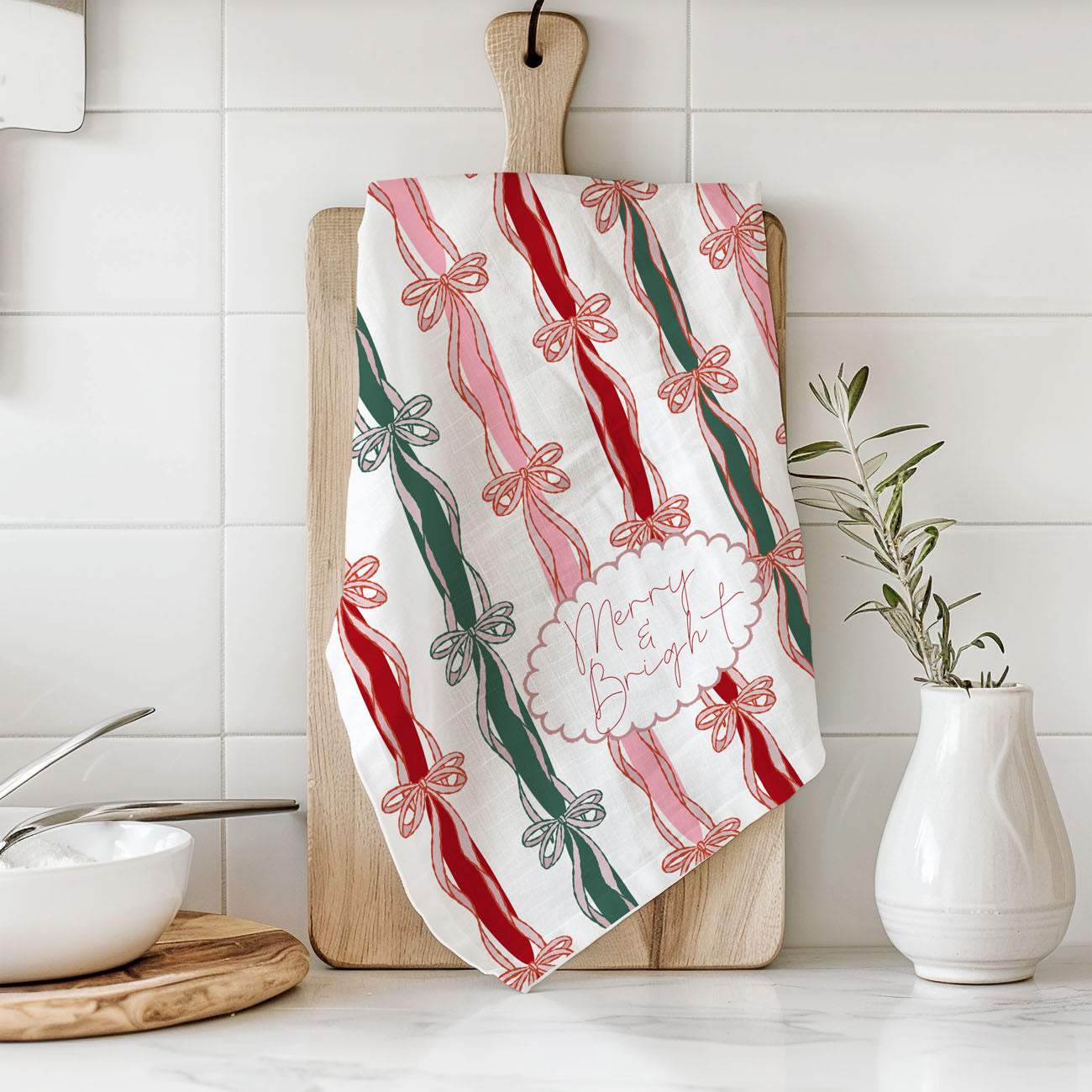 pink and green christmas ribbon bow kitchen towel decor
merry and bright kitchen towel with festive bow stripe pattern
christmas dish towel with bows for holiday home decor
holiday kitchen towel with ribbon stripes for baking season
cute christmas towel with bow print for farmhouse kitchen