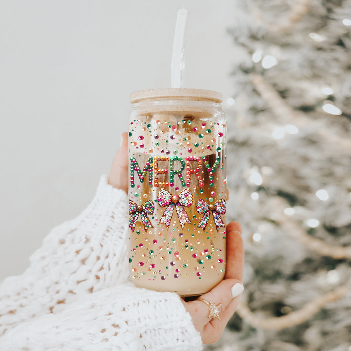 Holiday sparkle drinkware – glass cup with Merry design and festive accents
Unique Christmas coffee cup – glass tumbler with glitter, sequins, and coquette bows
