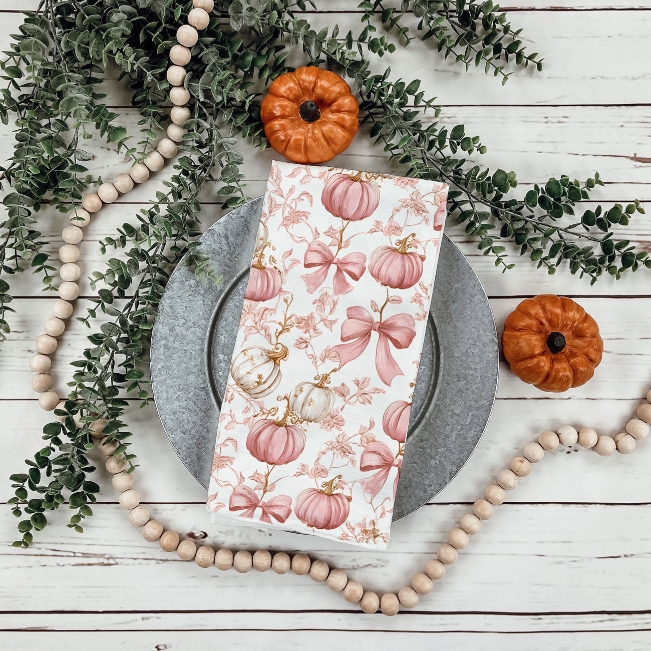 pink pumpkin gift towel for fall housewarming
pastel pink pumpkin hand towel for powder room décor
soft cotton pink pumpkin towel in feminine fall kitchen
pretty fall pumpkin and ribbon towel for bar cart décor
pink pumpkin design towel with delicate floral vines
