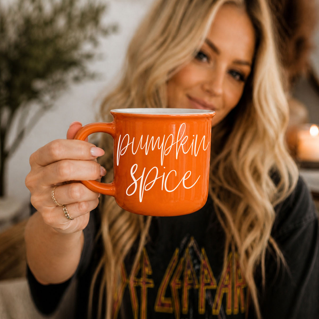 fall farmhouse style mug in neutral home
orange fall mug with rustic wood background
seasonal drinkware for fall and halloween lovers
cozy fall night mug with snacks and movie
autumn home office mug for remote work days