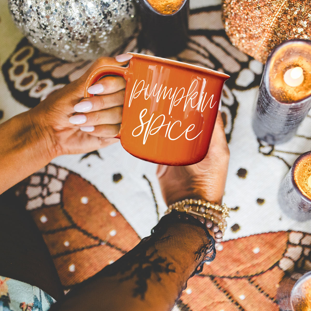 pumpkin spice drinkware for cozy season
pumpkin spice mug on fall coffee bar
pumpkin spice latte mug with whipped cream
pumpkin spice mug next to mini pumpkins