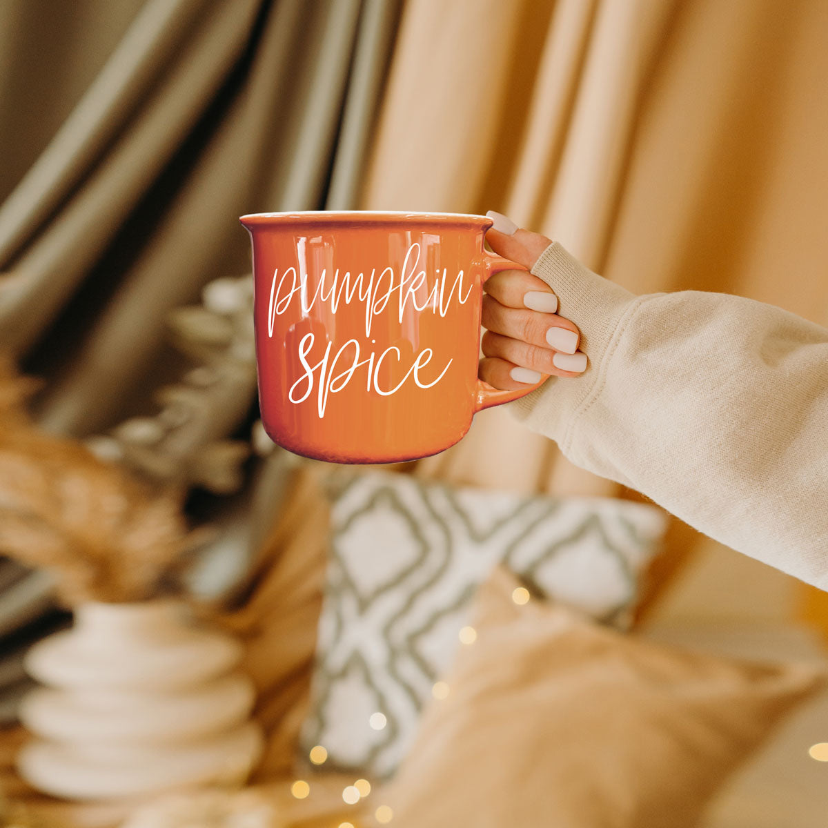 fall decor mug on entryway table
autumn orange mug with candles and leaves
fall birthday gift for autumn obsessed women
halloween party coffee mug for guests
fall kitchen shelf styling with orange mug